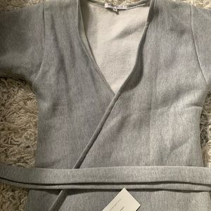 A wrap top, belt and skirt